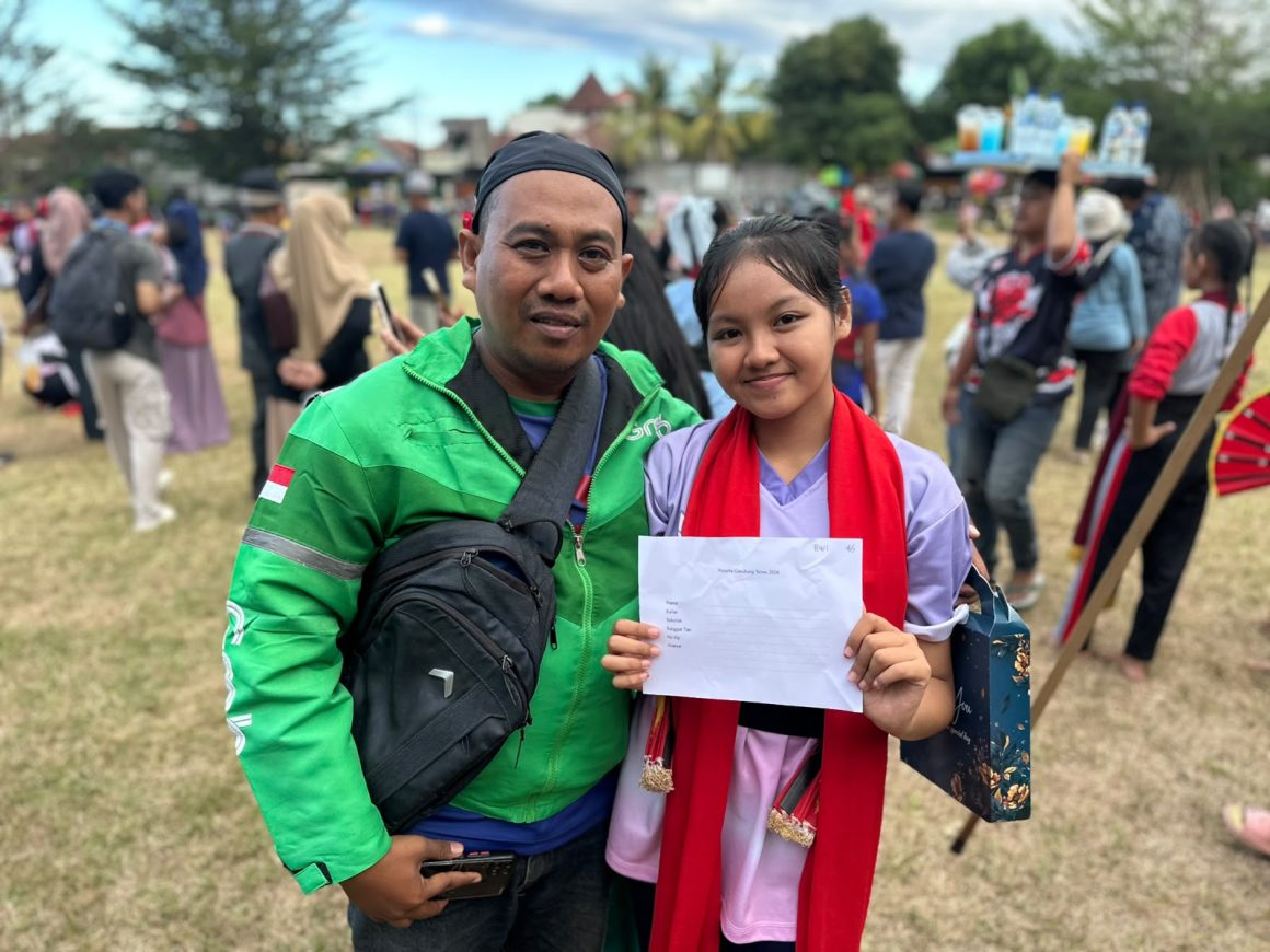 Demi Sang Buah Hati, Driver Ojol di Banyuwangi Rela Matikan Aplikasi Saat Seleksi Gandrung Sewu 2026