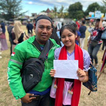 IMG-20260724-WA0003 Demi Sang Buah Hati, Driver Ojol di Banyuwangi Rela Matikan Aplikasi Saat Seleksi Gandrung Sewu 2026