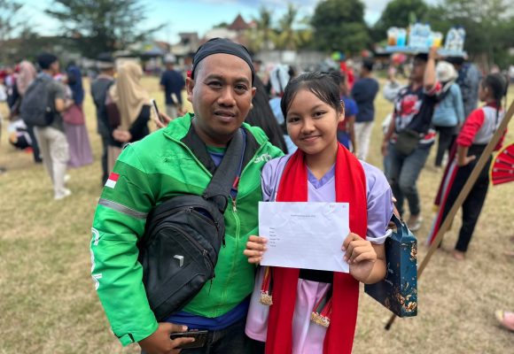 IMG-20260724-WA0003 Demi Sang Buah Hati, Driver Ojol di Banyuwangi Rela Matikan Aplikasi Saat Seleksi Gandrung Sewu 2026